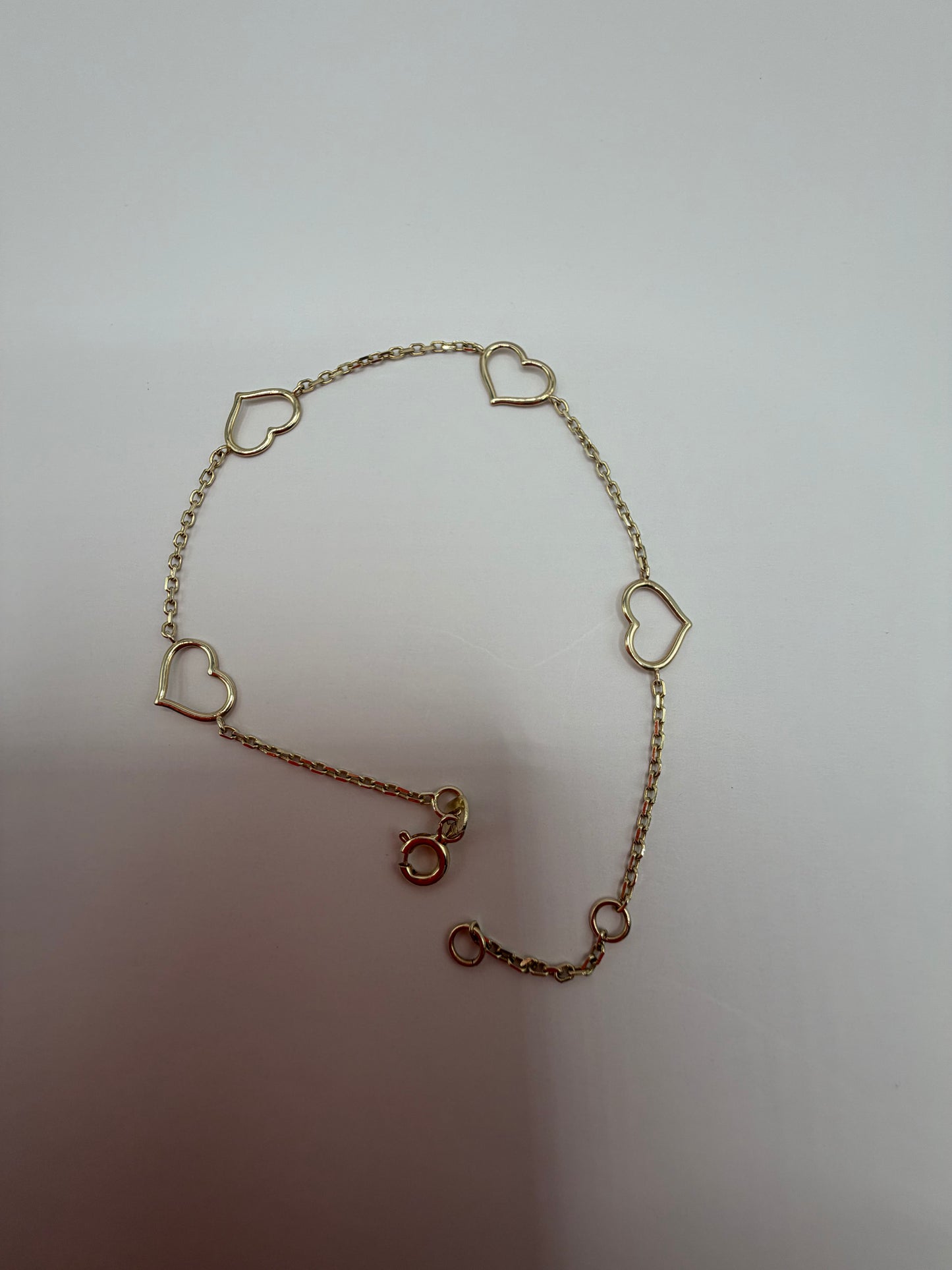 Pulsera con corazones en oro de 14k