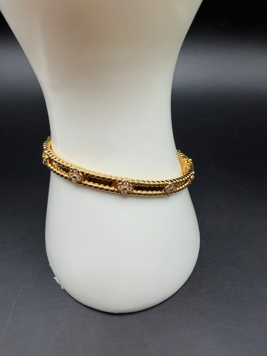 Pulsera elaborada en plata 925 con baño en oro de 14k con piedra Monssanaite